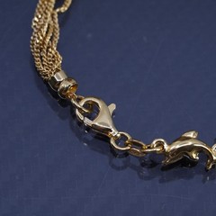 7”, Italian Milor vermeil yellow gold sterling silver bracelet, dolphin charms