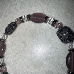 Handmade Purple and clear colored stone 7 inch bracelet.