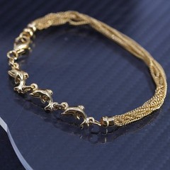 7”, Italian Milor vermeil yellow gold sterling silver bracelet, dolphin charms
