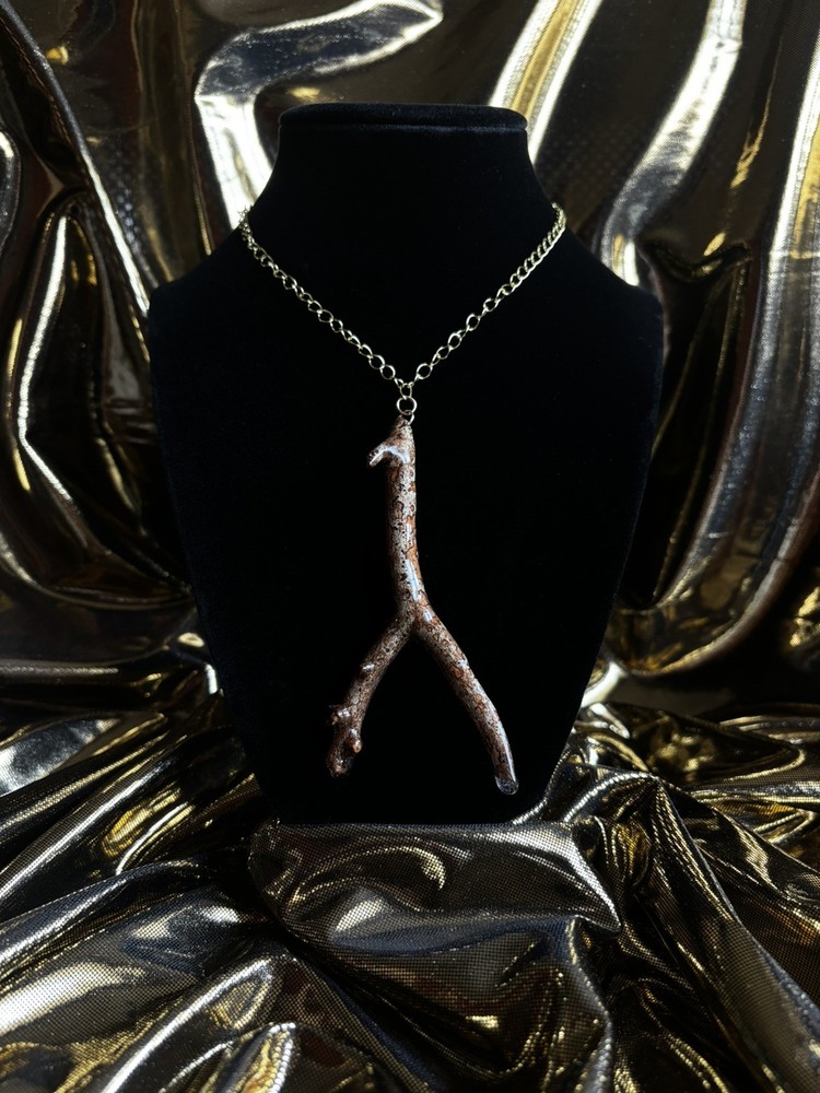 One of a kind jewelry made from real pieces of wood coated in resin