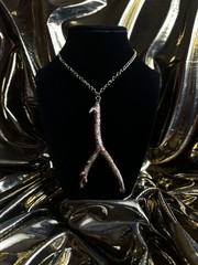 One of a kind jewelry made from real pieces of wood coated in resin
