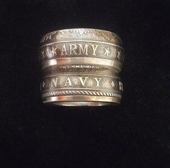 ARMY OR NAVY COIN RING. 999 SILVER. SIZES 10 TO 15