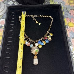 Adorned Crown Jewelry assemblage Pearl seascape bottle of sand shells necklace