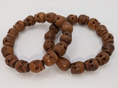 2 Skull Bead Bracelets. Carved Natural Wooden Skulls On Stretchy Cord Bracelet.