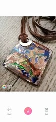 Retro Caribbean swirly glass necklace, handcrafted on a brown ribbon!