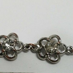 7 1/2″-9″ Adjustable 11 white Crystal Flowers Silver Tone Over Copper Bracelet