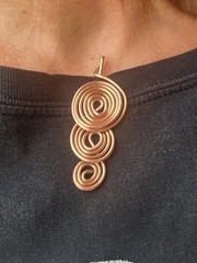 Versatile Copper Triskele Pendant Foe Keeping You Grounded And Energized.