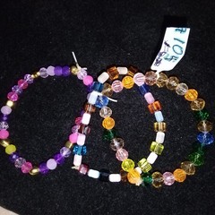 Three Strand Stretch Bracelets Multi-colored. Sizes-6″. Item# A105 .