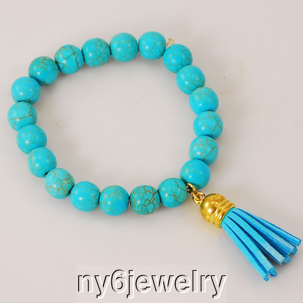 Blue Magnesite Turquoise Stretchy Bracelet w/Gold Tone & Blue Tassel Charm 8″