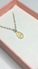 #235- .65ct Genuine Ethiopian Welo Opal on a Sterling Silver Chain