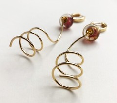 Unmatched earrings dangle, large spiral earrings gold tone