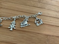 Christmas Charm bracelet – 9 silver charms on silver chain bracelet