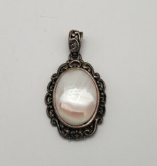 DESIGNER STERLING SILVER AND OYSTER SHELL PENDANT