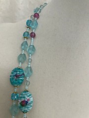Aqua Necklace 26″ 20mm floral beads and variety of beads separated by seed beads