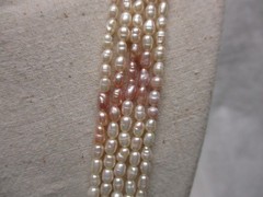 lovely 4 strand Rice Pearls Necklace white & pink 32″ waterfall Cultured Pearls