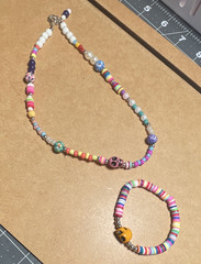 Multicolor Beaded Stretch Bracelet No Clasp Plastic Round Beads Skull Theme