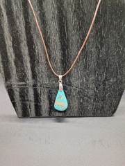 Kingman Turquoise Stone Pendant With Silvertone Bail On Brown Leather Cord