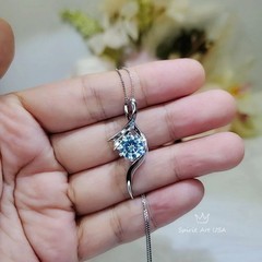 Blue Aquamarine Necklace, White Gold Coated Sterling Silver, Bow 2 CT Blue