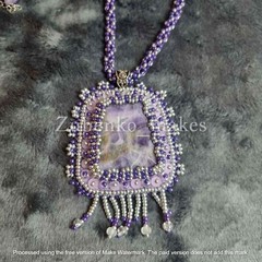 Elegant pendant with white and purple amethyst, beads and long beaded rope