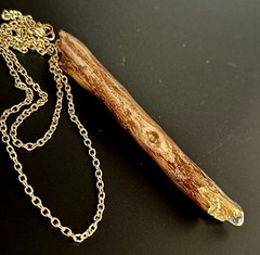 Handmade one of a kind jewelry made from real pieces of wood coated in resin