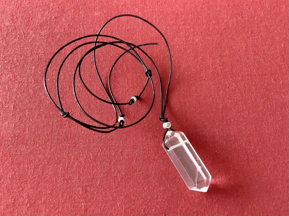 Quartz Crystal Point Pendant with Black Leather Cord Adorned with S.S. Beads.
