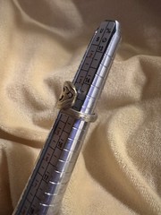Silver/goldish Size 4 Spoon Ring