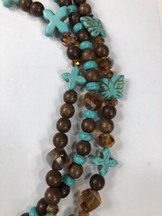 Artisan Necklace Southwest Beaded Blue & Brown Cross Multi Strand – 24 in Length