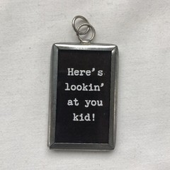 Handmade Reversible Soldered Pewter Charm Pendant “Here’s lookin’ at you kid!”