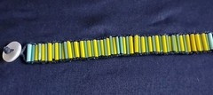 6 1/2 Inch Long Glass Bead, Hemp Twine, Polyester Thread, Plastic Button Closure