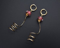 Unmatched earrings dangle, large spiral earrings gold tone
