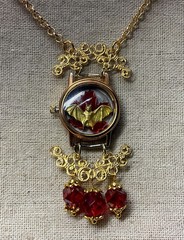 Bat Necklace- Bat On Red Leaf In Watch Case, Red Glass Beads, Gold Tone, 18-20”