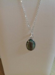 Artisan crafted,1” oval agate cab in stainless bezel, on 22” delicate silver pla