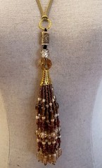 Beautiful Glass Beaded Tassell Necklace With Golden Accents