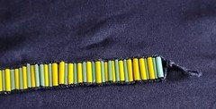 6 1/2 Inch Long Glass Bead, Hemp Twine, Polyester Thread, Plastic Button Closure