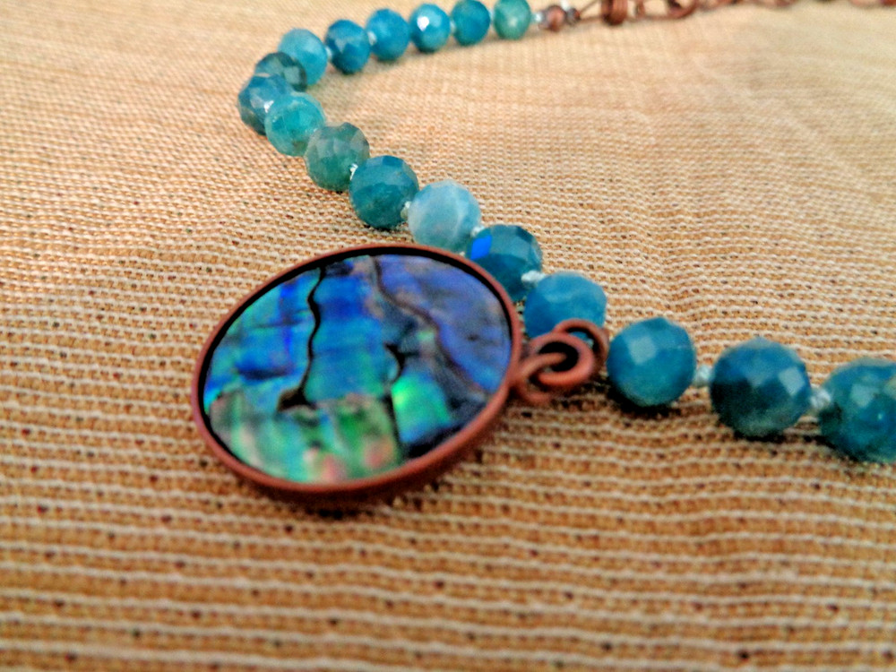 Artisan crafted,Abalone pendant on 18” faceted apatite and copper strand. Beauti