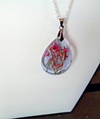 Artisan crafted, 2 ¼» resin teardrop with pressed flower bouquet on 20” delicate