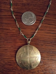 Pendant Necklace with Gold Plated Knotted Cross Disc and Green Enamel Chain