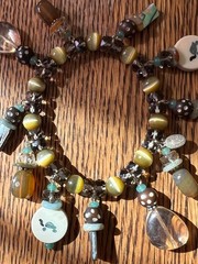 Artisan Handmade Multi-Bead Charm Bracelet with Stones and Carved Discs