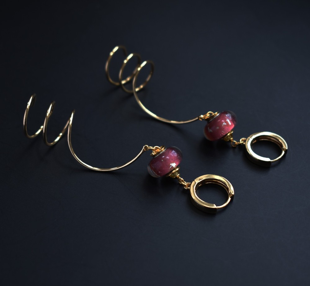 Unmatched earrings dangle, large spiral earrings gold tone