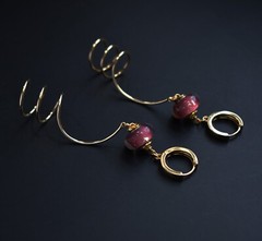 Unmatched earrings dangle, large spiral earrings gold tone
