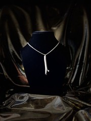 One of a kind jewelry made from real pieces of wood coated in resin