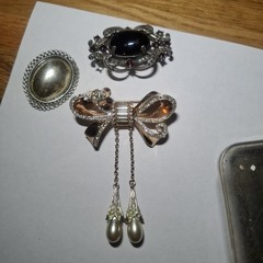 Sterling silver vintage brooch Pin lot Bow Lot Of 3. 46.8 grams Costume jewelry.