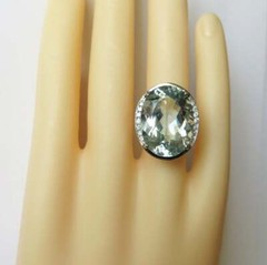 Features 34.42 Carat Sky Blue Topaz and 0.26 Carat White CZ Elegant Women’s Ring