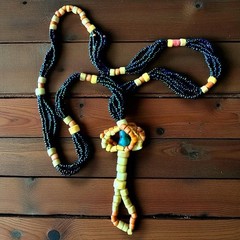 Boho Hippie Beaded Necklace 1970s Folk Art Black Seed Beads Yellow Pendant