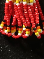 Handmade First Nation Woman Earrings With White Red Black And Yellow Seedbeads