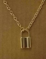 MIP- Gold Tone Padlock w/ 20 inch matching chain with a lobster clasp closure