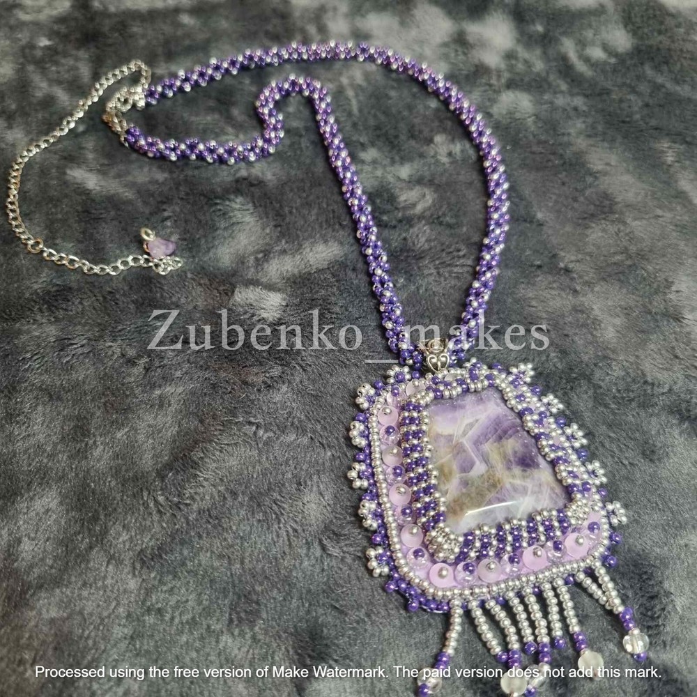 Elegant pendant with white and purple amethyst, beads and long beaded rope