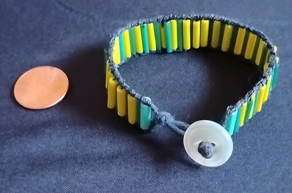 6 1/2 Inch Long Glass Bead, Hemp Twine, Polyester Thread, Plastic Button Closure
