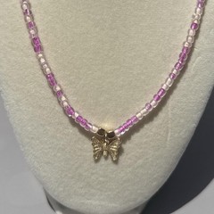 Pink/ white beaded necklace Butterfly charm Pink/white translucent Beads NWT