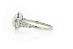Features A Central 1.13CT Round European Cut CZ With Blue Sapphire Art Deco Ring